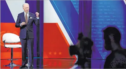  ?? Evan Vucci The Associated Press ?? President Joe Biden talks during a televised town hall event Tuesday at Pabst Theater in Milwaukee.