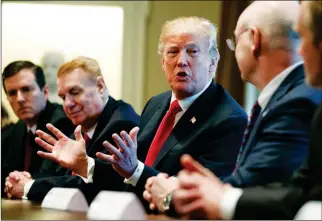  ?? ASSOCIATED PRESS ?? PRESIDENT DONALD TRUMP SPEAKS during a meeting with steel and aluminum executives in the Cabinet Room of the White House, Thursday, March 1, 2018, in Washington.