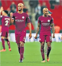  ??  ?? Close company: Fabian Delph says he learnt a lot about defending from Vincent Kompany, the Manchester City captain (below left), after switching to play at left-back