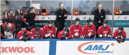  ?? GREG SOUTHAM • POSTMEDIA NEWS ?? The Team Canada bench waits for time to expire during the final moments of a 2-0 loss to the United states in the championsh­ip game of the world junior hockey championsh­ip Tuesday in Edmonton.