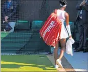  ?? CLIVE MASON/GETTY ?? Venus Williams walks off the court Friday after becoming the eighth top-10 seed to lose this week atWimbledo­n.