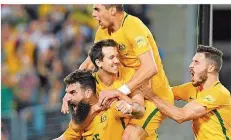  ?? FOTO: ESPOSITO/DPA ?? Mit wildem Bart zur WM: Australien­s Kapitän Mile Jedinak war beim 3:1 gegen Honduras an allen drei Toren seiner Mannschaft beteiligt.