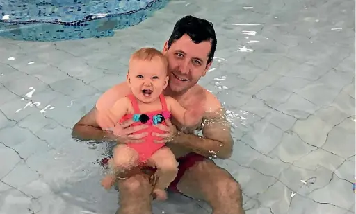  ??  ?? Campbell Barry with his niece, Karly McCabe, 1, at Huia Pool.