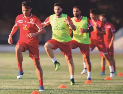  ??  ?? Malta’s Andre’ Schembri, left, who is enjoying a new lease of life with Apollon Limassol in Cyprus, trains ahead of Malta’s big FIFA World Cup qualifier against England