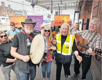  ?? ?? Drumming up support Festival in 2019
Some of the singers and musicians who peformed at the last Girvan Folk