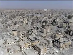  ?? PHOTO/GABRIEL CHAIM ?? This Oct. 19, image from drone video, shows damaged buildings in Raqqa, Syria, two days after Syrian Democratic Forces said military operations to oust the Islamic State group ended. A U.S. military official says that the American-backed Syrian...