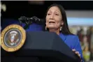  ?? Photograph: Evan Vucci/AP ?? Deb Haaland, interior secretary, declared ‘squaw’ to be a derogatory term on 19 November and said she is taking steps to remove the term from federal place names.