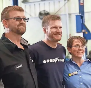  ?? BRIAN RICHARDSON, USA TODAY SPORTS ?? Dale Earnhardt Jr., second from left, visits workers at one of his Tallahasse­e dealership­s.