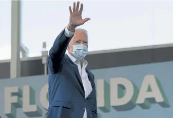  ?? Carolyn Kaster, The Associated Press ?? Former Vice President Joe Biden waves to a crowd Tuesday at Miramar Regional Park in Florida.