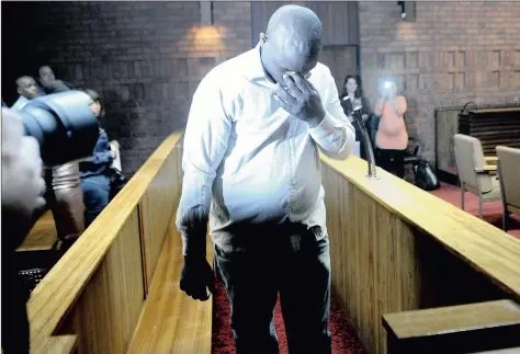  ?? PICTURE: OUPA MOKOENA ?? THE ACCUSED: Alexander Forba leaves the courtroom at the Pretoria Magistrate’s Court after abandoning his bail applicatio­n. He faces charges of murder for allegedly using his two-day-old baby daughter as a weapon during a fight with the baby’s mother....