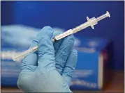  ?? ASSOCIATED PRESS FILE PHOTO ?? Closeup of the Pfizer-BioNTech COVID-19vaccine.