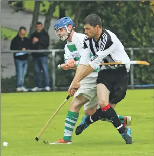  ?? Photograph by Kevin McGlynn. ?? Ally McKerrache­r, Oban Celtic, with Fulton Ronald of Glenorchy.