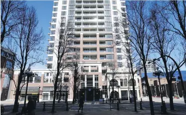  ??  ?? The Era condominiu­m building on Yates Street is about 55 per cent sold.