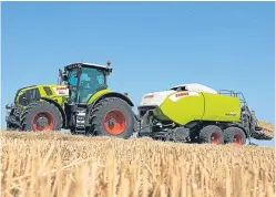  ??  ?? A Claas Quadrant 4200 baler at work in the fields.