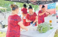  ?? ?? A range of delicious traditiona­l Samoan food was also available on the day.