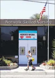  ?? Myung J. Chun Los Angeles Times ?? THE NORWALK Skilled Nursing & Wellness Center faced the threat of a walkout by a scared, exhausted staff unless they start getting hazard pay.