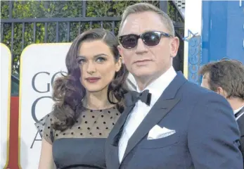  ?? FOTO: DPA ?? Daniel Craig mit Ehefrau Rachel Weisz, die Anfang September die gemeinsame Tochter zur Welt brachte.