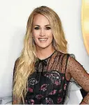  ?? [PHOTO BY RICHARD SHOTWELL, INVISION/AP FILE] ?? Carrie Underwood attends the 2018 Radio Disney Music Awards on June 22 in Los Angeles. Underwood says she turned to God after experienci­ng three miscarriag­es in the past two years.