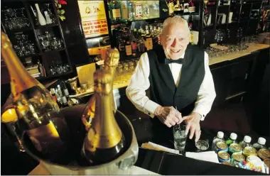  ?? MARIE-FRANCE COALLIER/ GAZETTE FILES ?? Omer Brousseau, behind L’Autre Saison bar on Crescent Street, was acclaimed as Montreal’s best martini-maker.