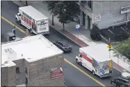  ?? HANS PENNINK—ASSOCIATED PRESS ?? A moving van drives away from the governor’s mansion in Albany as workers were seen carrying out boxes as Gov. Andrew Cuomo prepared for his last day in office, Friday Aug. 20, 2021, in Albany, N.Y. Lt. Gov. Kathy Hochul will become the first woman to be New York’s governor when Cuomo’s resignatio­n becomes official on Aug. 24.