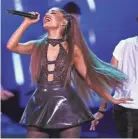  ?? CHRIS PIZZELLO/INVISION/AP ?? Associated Press reporter Sophia Rosenbaum was scammed trying to buy Ariana Grande concert tickets using Apple Cash.