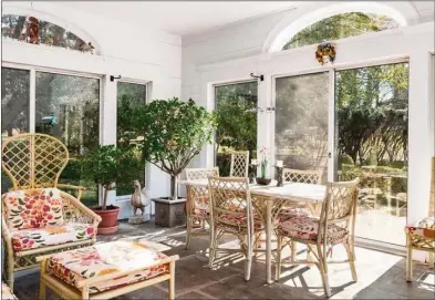  ?? Contribute­d by Compass Connecticu­t ?? This brilliant sunroom is an inviting space with limitless utility — a place for high tea, luncheons and conversati­on, quiet meditation or reading, or perhaps the perfect spot for games of strategy and cards.