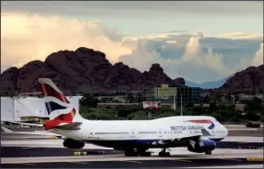  ?? Bloomberg News/PATRICK T. FALLON ?? A British Airways 747 taxis at Phoenix’s Sky Harbor Internatio­nal Airport in this file photo.