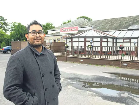  ??  ?? Sunny Mollah outside the former Rancho Pancho in Wellbank, which he plans to turn into Sunny’s Bar and Grill.