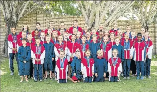  ?? Picture: WILMA BOW ?? A JOB WELL DONE: The Harlequins swimming team which won the Buffalo City Acquatics Championsh­ip for the third consecutiv­e year stand tall as they prepare for the upcoming provincial­s next month