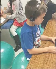  ??  ?? John and B.J. Dye, owners of Dye Hards Gym, Pea Ridge, sponsored a first-grade classroom and provided enough stability balls for each student to have one instead of a chair.