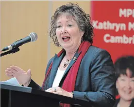  ?? BRENT DAVIS WATERLOO REGION RECORD ?? Kathryn McGarry, Ontario Transporta­tion Minister and Cambridge MPP, speaks Friday at Cambridge City Hall as a feasibilit­y study for GO train service to the city via Guelph is announced.