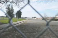  ?? BEA AHBECK/NEWS-SENTINEL ?? An undevelope­d, fenced off area next to Salas Park in Lodi on Tuesday.