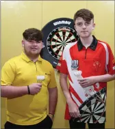  ??  ?? Patrick Holmes, Buttevant and Paddy Bowler, Ballycloug­h showed of their darts prowess.