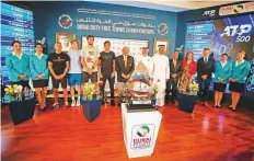  ?? Courtesy: Organisers ?? Players with officials during the men’s draw for the Dubai Duty Free Tennis Championsh­ips yesterday.