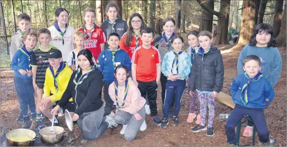  ?? (Pic: John Ahern) ?? GRUB’S UP: Ballyhooly scouts preparing a meal during last Saturday’s Informatio­n Day in Castlebla Forest.