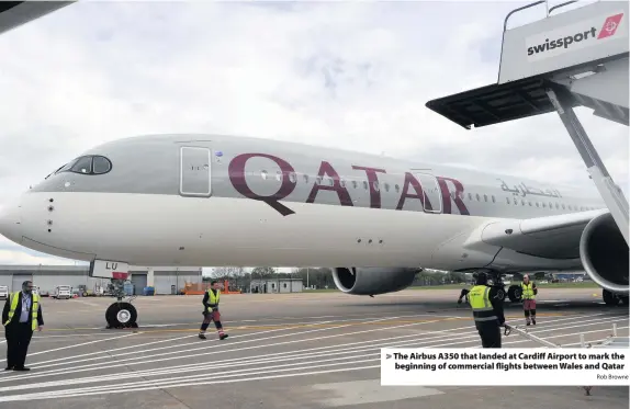  ?? Rob Browne ?? > The Airbus A350 that landed at Cardiff Airport to mark the beginning of commercial flights between Wales and Qatar