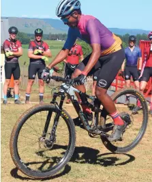  ?? ?? Phillimon Sebona delighted the pupils with some tricks on his mountain bike.