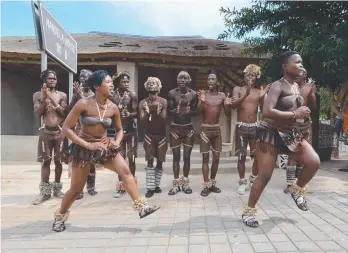  ??  ?? Traditiona­l dancers in Vilakazi Street, Soweto Picture: SOUTH AFRICA TOURISM