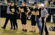  ?? MARK HUMPHREY ENTERPRISE-LEADER ?? Despite missing most of his senior season with an injury, Prairie Grove’s Luke Johnson (second from right), has remained active in support of the football team. Here he is with fellow co-captains, Colton Teekell, Spencer Gauldin and Matt Drymon, coming...