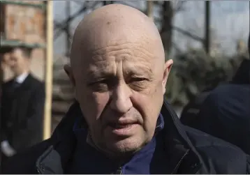  ?? THE ASSOCIATED PRESS ?? Yevgeny Prigozhin, the owner of the Wagner Group military company, arrives during a funeral ceremony at the Troyekurov­skoye cemetery in Moscow, Russia, on April 8. He died a few months later in a mysterious plane crash.