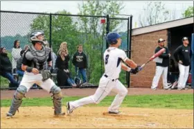  ?? DEBBY HIGH — FOR DIGITAL FIRST MEDIA ?? La Salle’s Jack Pogyor swings as Wood’s catcher John Gifford watches the ball during the bottom of the 1st inning of Saturday’s PCL playoff game.