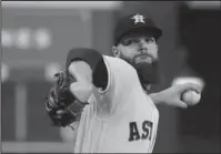  ?? The Associated Press ?? FROM THE LEFT: Former Arkansas Razorback Dallas Keuchel starts on the mound for the Houston Astros against the visiting New York Yankees tonight in the opening game of the American League Championsh­ip Series.