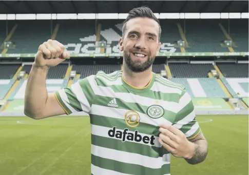  ??  ?? 0 Shane Duffy grew up in Derry supporting Celtic and said the chance to join the club was impossible to refuse.