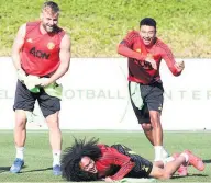  ??  ?? LIgHTer vIbeS Shaw, Chong and Lingard during training