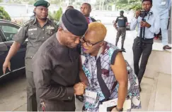  ??  ?? So long, farewell: Lola Shoneyin bids Vice President Osinbajo goodbye