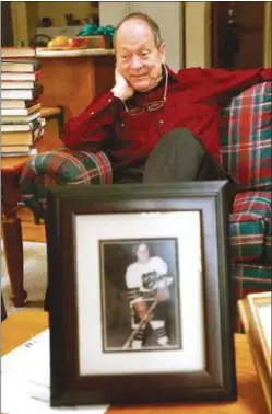  ?? OAKLAND PRESS FILE PHOTO ?? Barry King of Birmingham, who died Nov. 19, 2020, is being honored by CARE House of Oakland County on Jan. 28. In this photo taken by The Oakland Press, King displayed a picture of his son Timothy, who was murder by the Oakland County Child Killer.