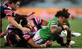  ?? Photograph: Dan Himbrechts/AAP ?? Josh Papalii seizes the moment to score in the Raiders’ victory over the Rabbitohs.
