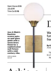  ?? JOSS & MAIN VIA AP ?? Joss &amp; Main’s Bautista sconce pairs an opal glass globe with a warm brass finish for a sophistica­ted wall fixture with a midcentury vibe.