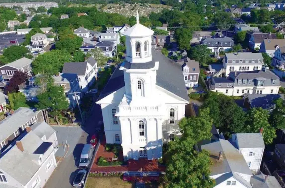  ??  ?? QUAINT VIEW: An aerial view spotlights the Provinceto­wn Library in the foreground.