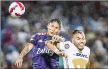  ?? ?? Nicolas Freire of Mexico’s Pumas (right), and Raul Ruidíaz of United States’ Seattle Sounders fight for the ball during the first leg of the CONCACAF Champions League soccer final, in Mexico City. (AP)